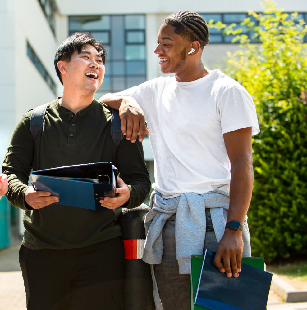 Two learners collaborating outside a learning centre